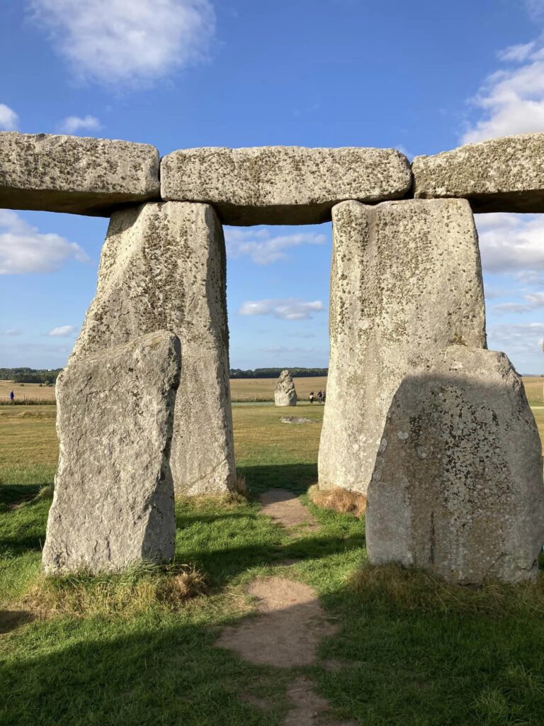 Picture taken from the inside of Stonehenge, looking out through two pillars at the heel stone.